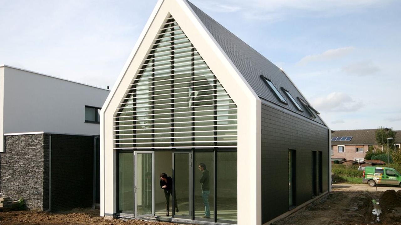 Beurs Eigen Huis FOAM Architecten architect aan tafel droomhuis ontwerp