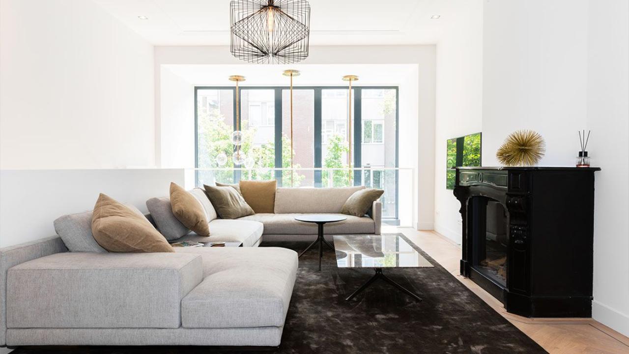 Beurs Eigen Huis FOAM Architecten architect aan tafel droomhuis ontwerp